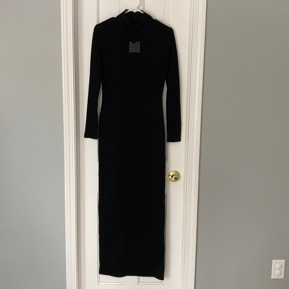 Black knit maxi dress with heart cutout at neckline